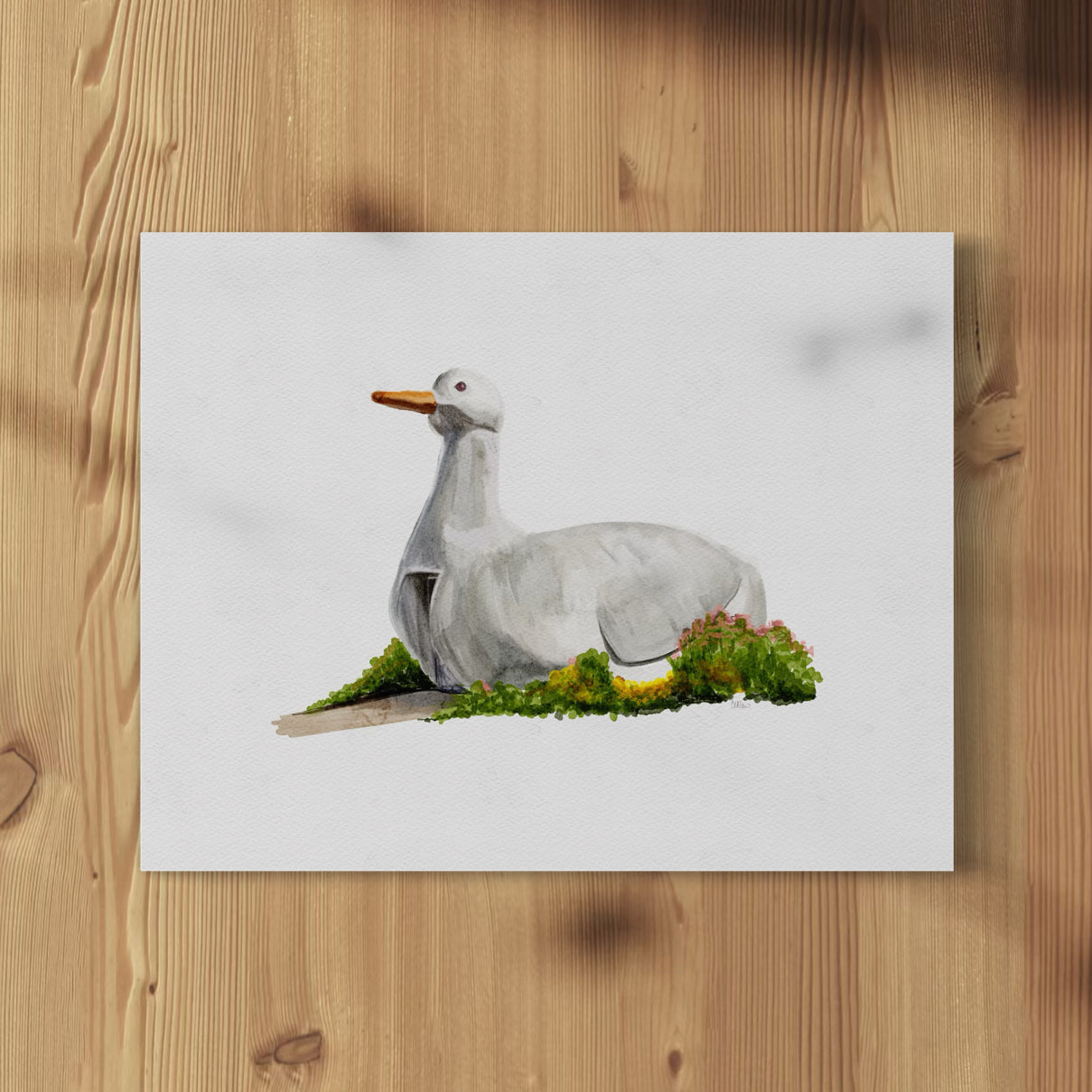 A framed watercolor print of the Big Duck, a famous roadside attraction in Flanders, Long Island, displayed against a white background.
