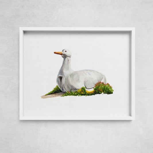 A framed watercolor print of the Big Duck, a famous roadside attraction in Flanders, Long Island, displayed against a white background.
