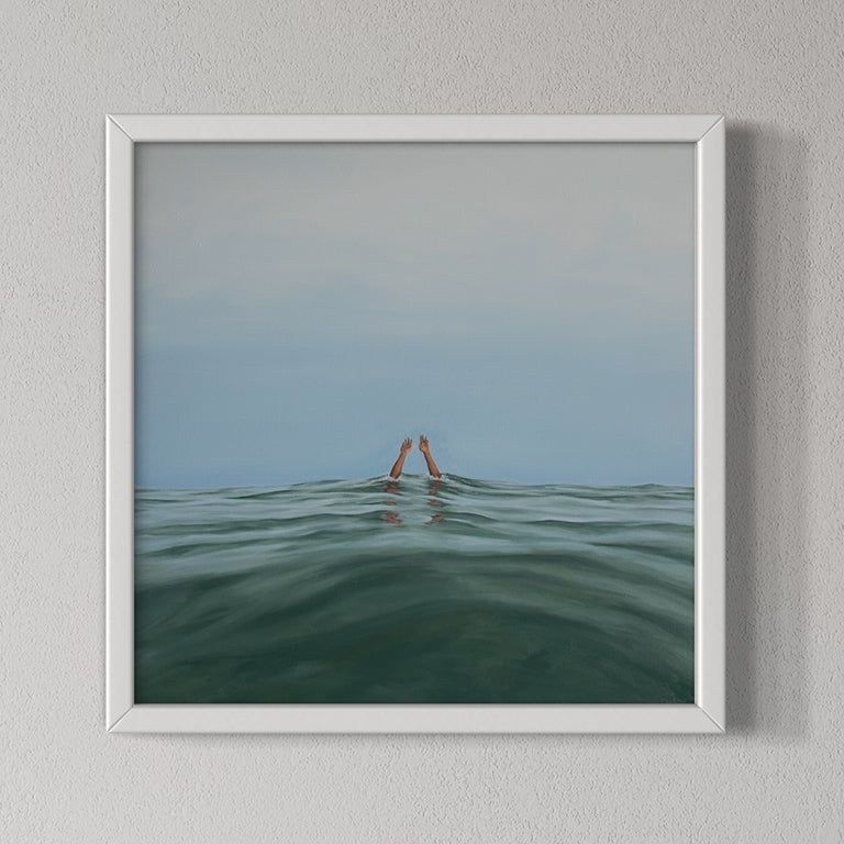 Framed artwork of a person standing in water with a minimalistic background