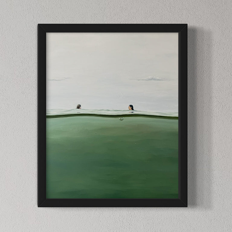 Framed artwork of a minimalistic scene with two figures on a green field and white sky.
