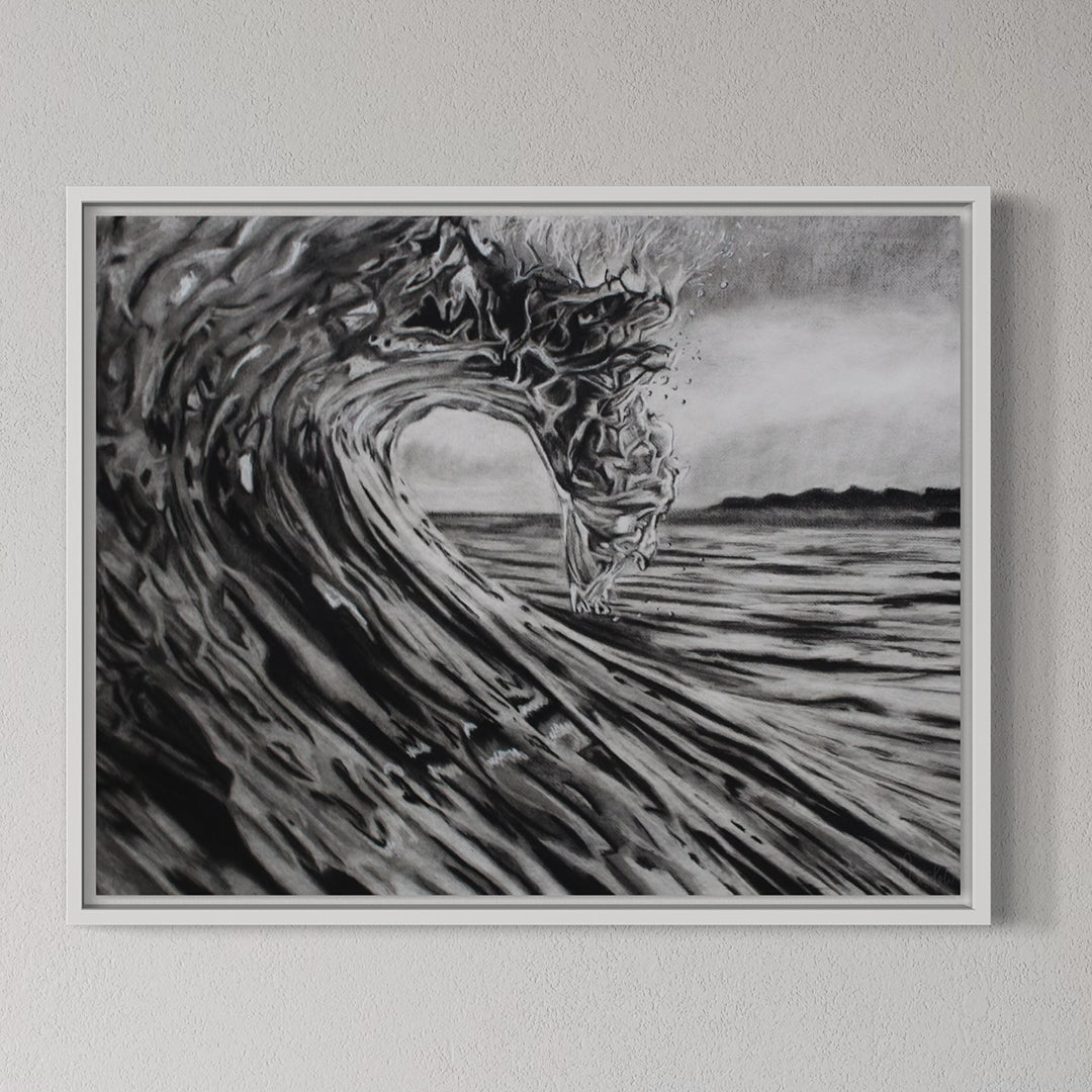 Framed artwork of a dragon emerging from a wave on a gray wall