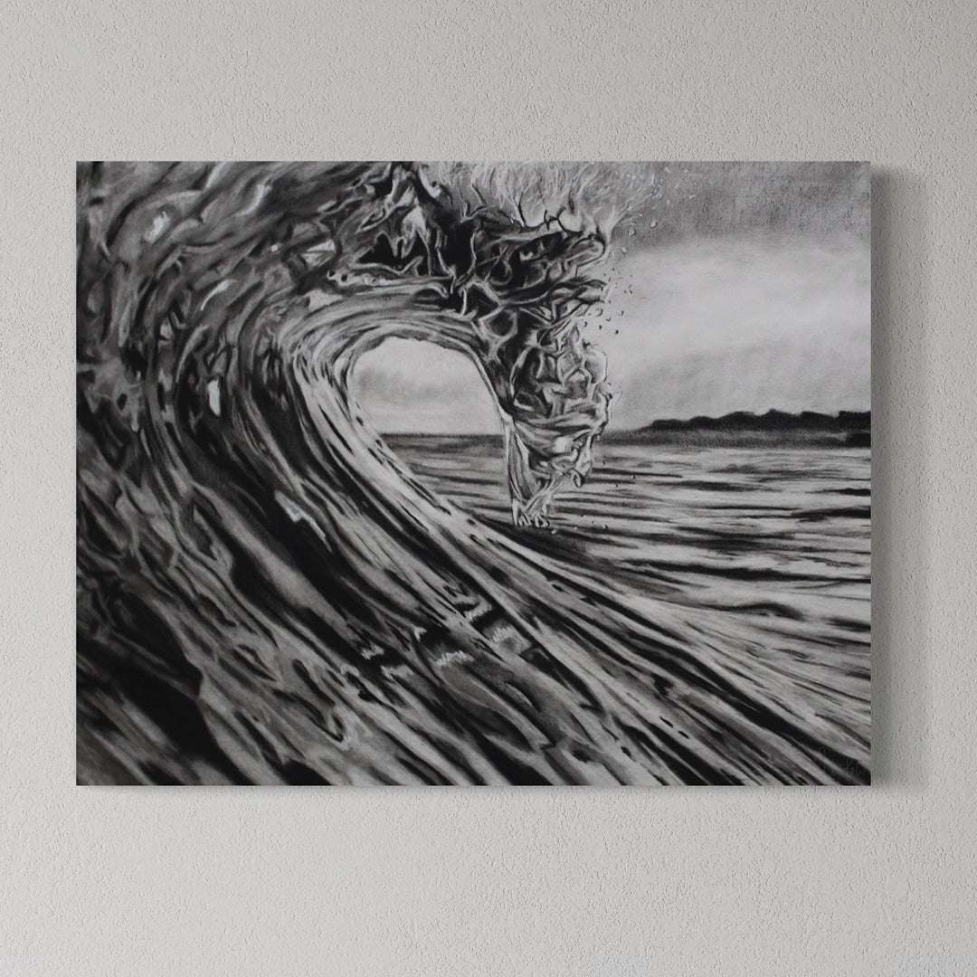 Canvas print of a black and white wave art on a plain wall