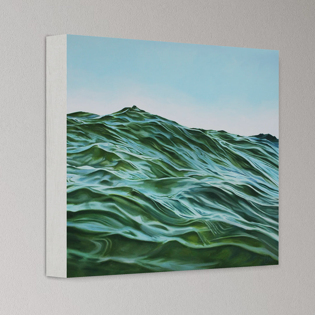 Canvas print of wavy green landscape on a gray wall