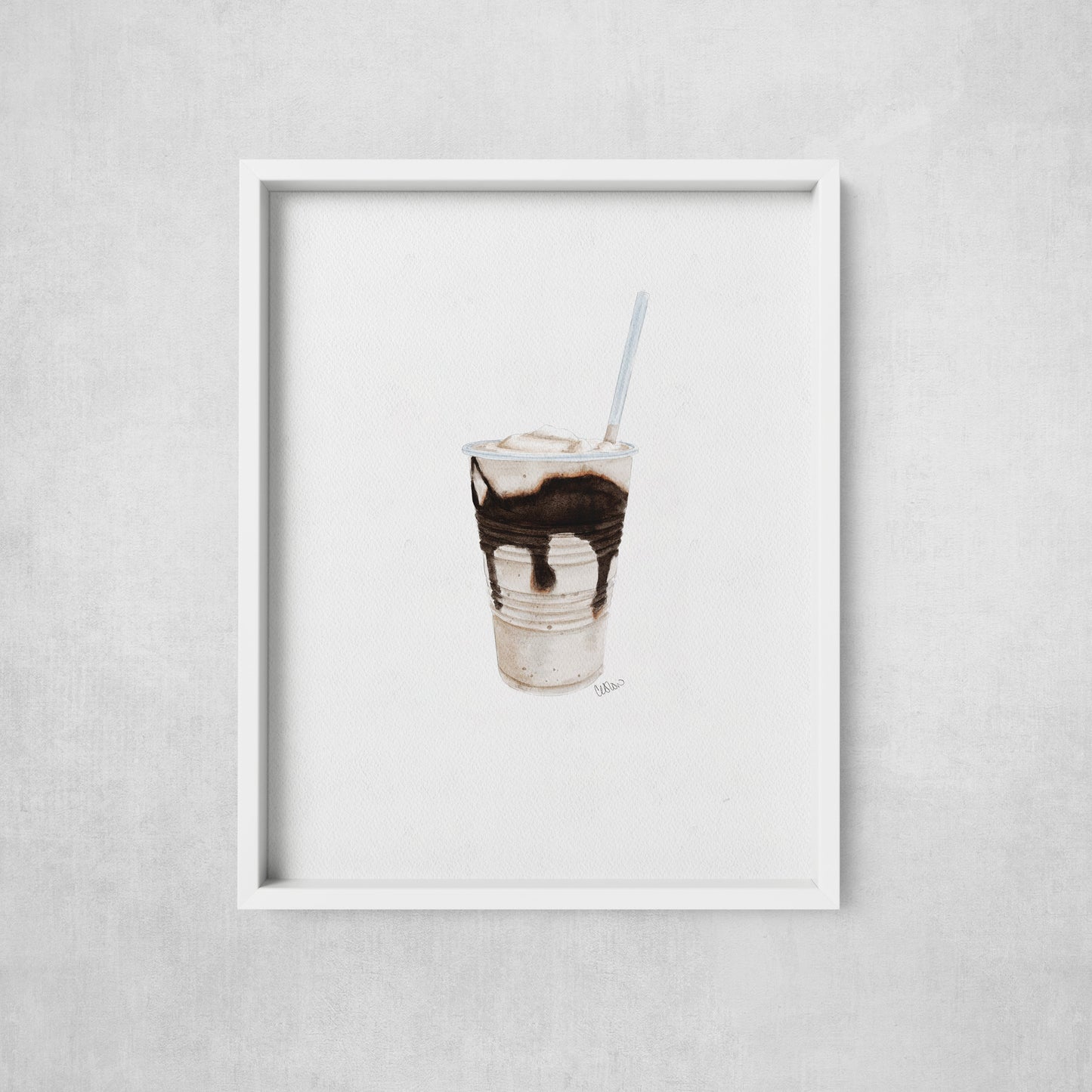 Framed artwork of a milkshake with chocolate syrup on a gray wall