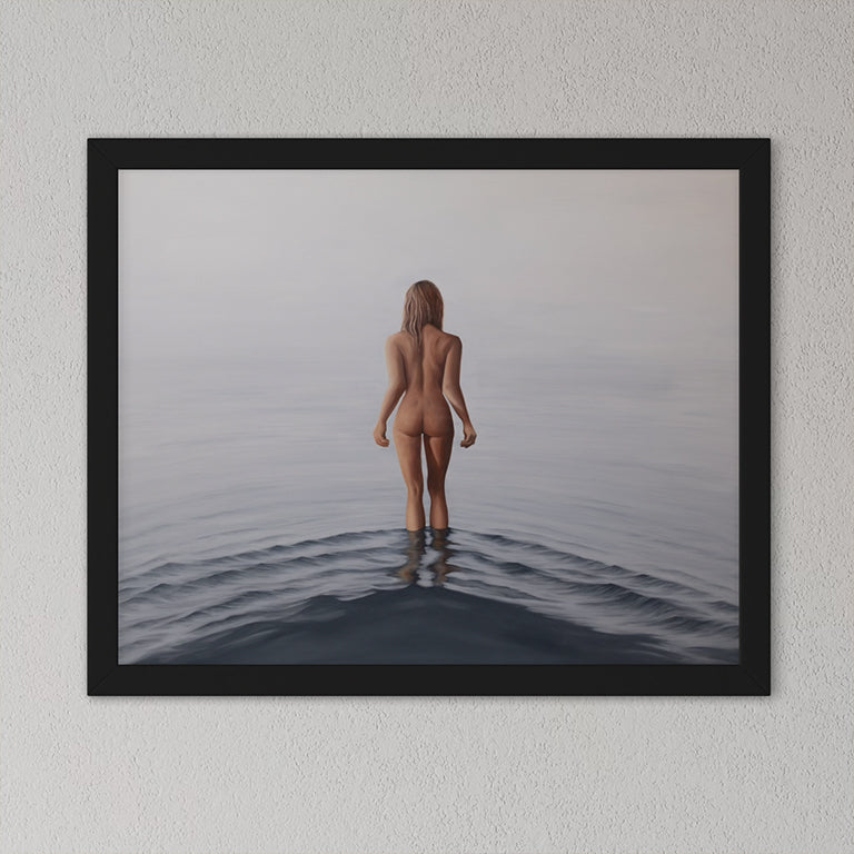 Framed artwork of a nude figure standing in water on a plain wall.