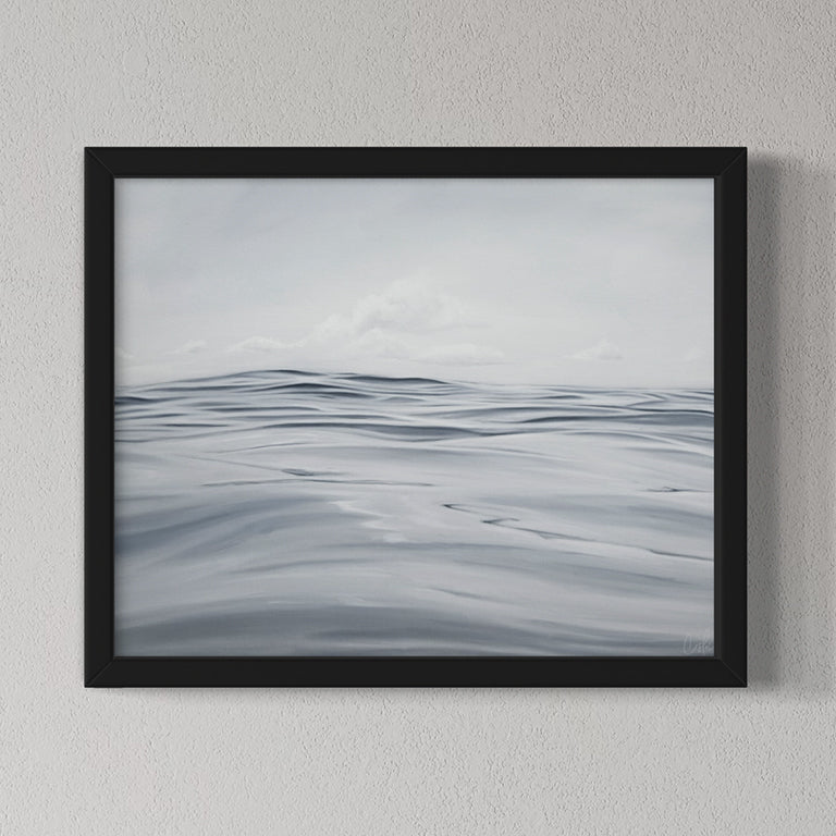 Framed abstract art piece with wavy patterns on a gray wall