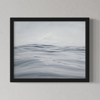 Framed abstract art piece with wavy patterns on a gray wall