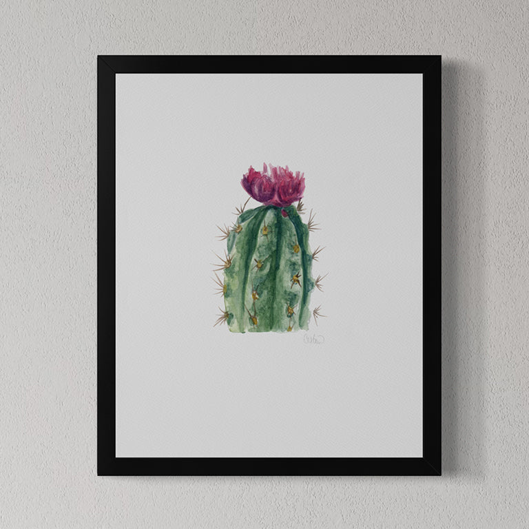 Framed artwork of a cactus with pink flower on a light gray background
