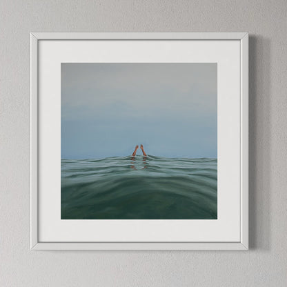 Framed artwork of a person in the water with a minimalistic background
