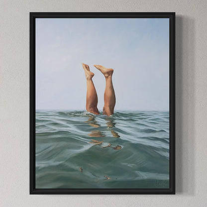 Framed artwork of legs emerging from water on a gray wall