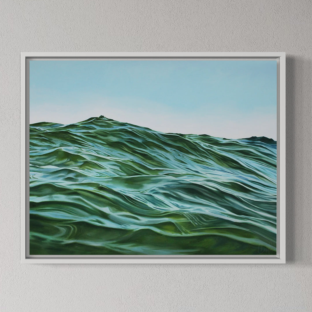 Framed artwork of wavy green patterns on a gray wall