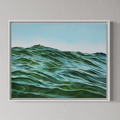 Framed artwork of wavy green patterns on a gray wall