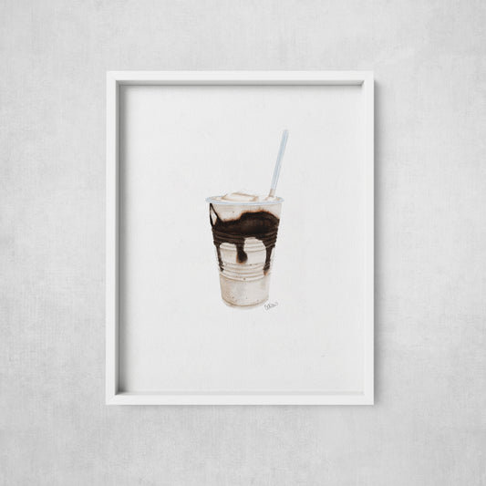 Framed artwork of a milkshake with chocolate syrup on a gray wall