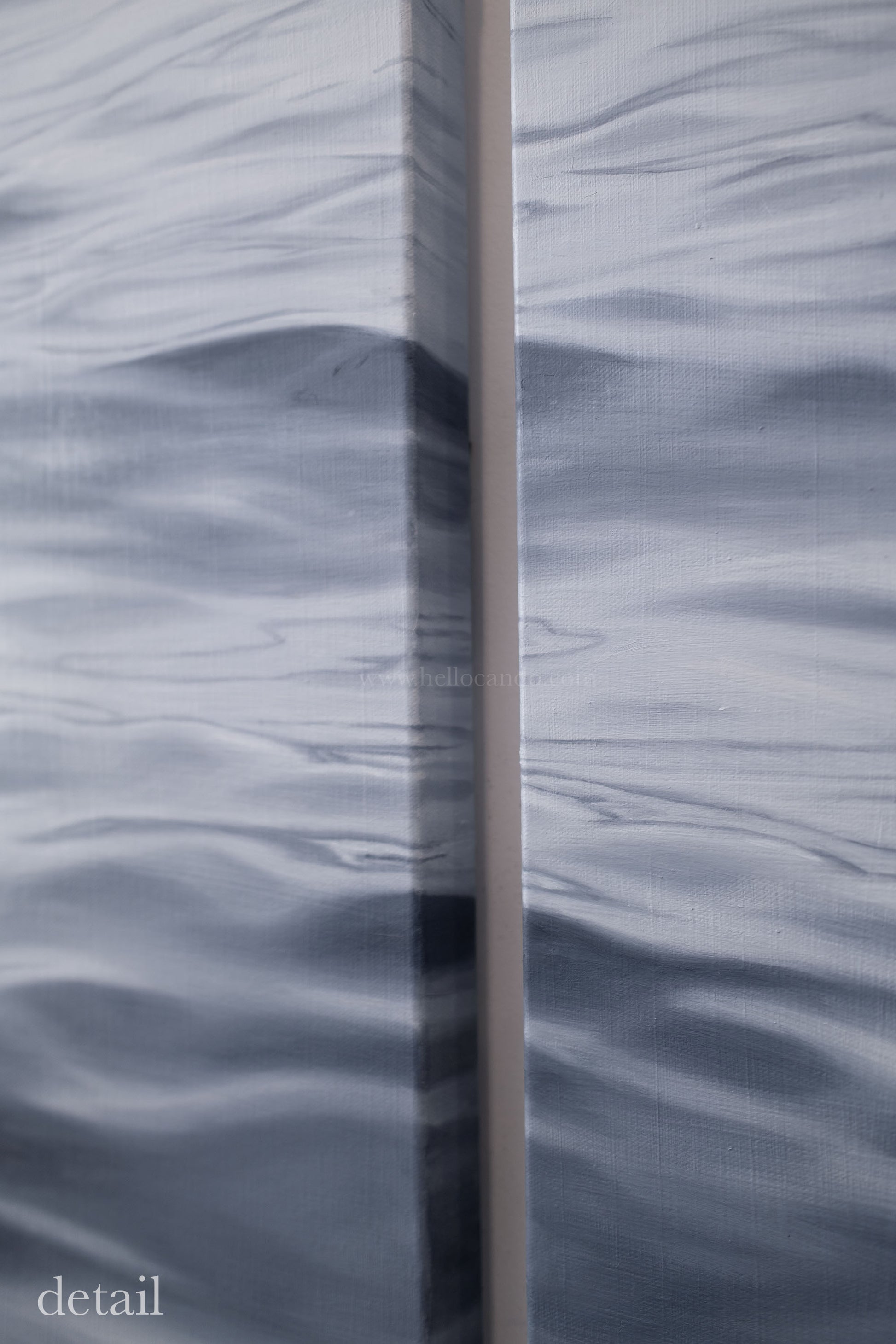 Side view detail of hand-painted ocean triptych showing canvas depth and flowing wave continuity.