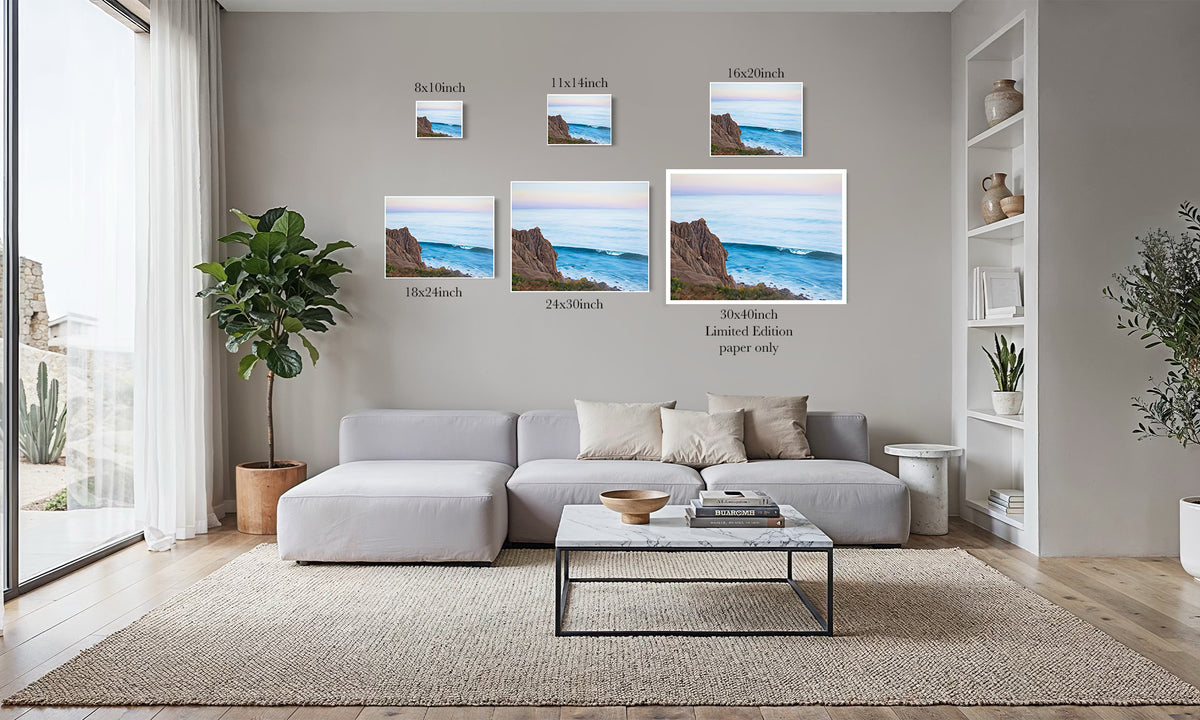 All We Have is Here coastal cliff art print size comparison chart from 8x10 to 30x40 inch limited edition, shown in a living room