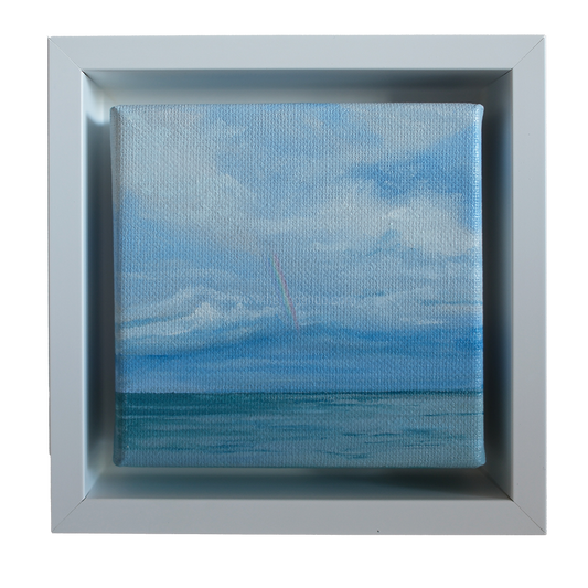 Mini oil painting of a faint rainbow over the ocean beneath soft clouds.