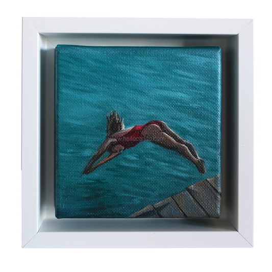Mini #41 original swimmer oil painting framed in white — small coastal artwork of woman diving into turquoise water.