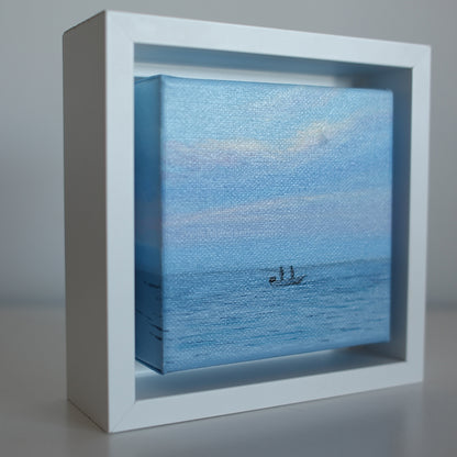 Side angle of Mini #42 framed 4x4 coastal artwork — textured oil painting of fishermen on serene ocean water.