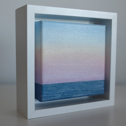 Side view of Mini #44 Soft Horizon — original pastel seascape oil painting framed in modern white shadow box.