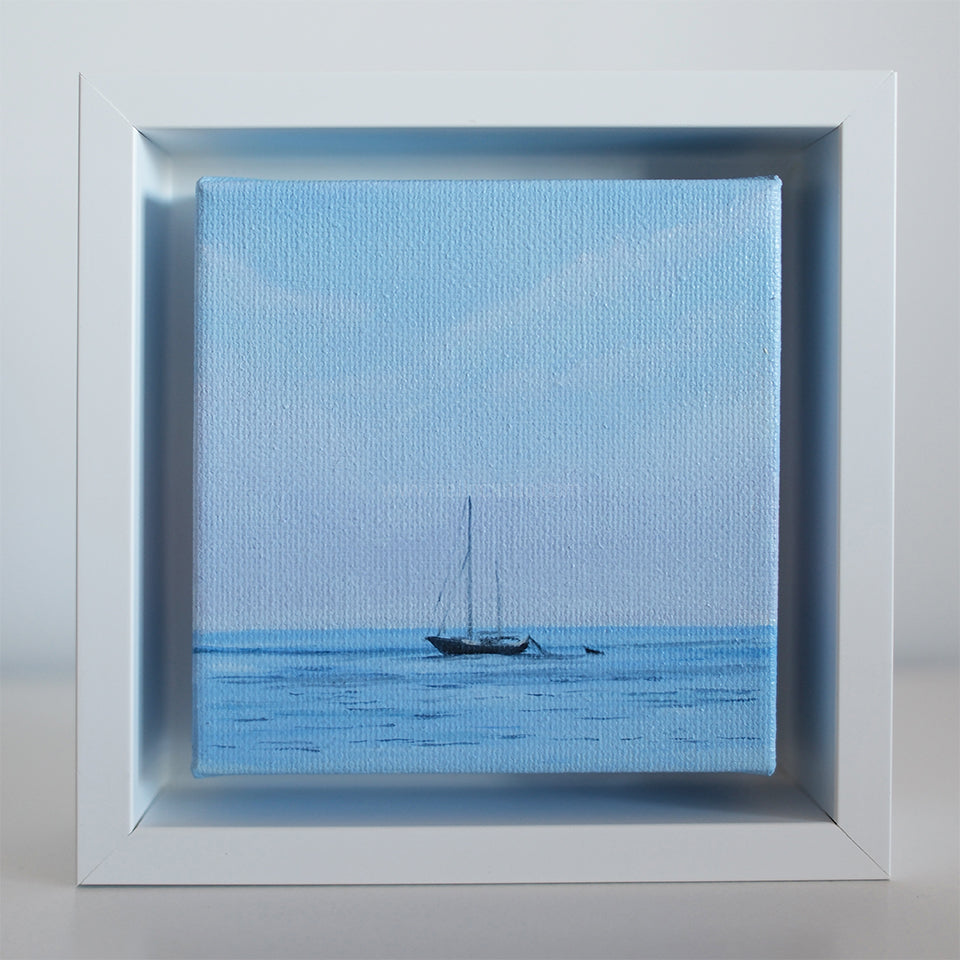 Mini #46 framed coastal artwork — tiny sailboat drifting on still water under soft pastel sky, original oil painting by Candace Ceslow.