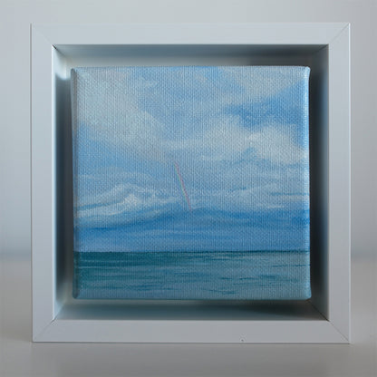 4x4 inch mini oil painting showing a pale rainbow reaching down toward the sea with soft blue clouds above