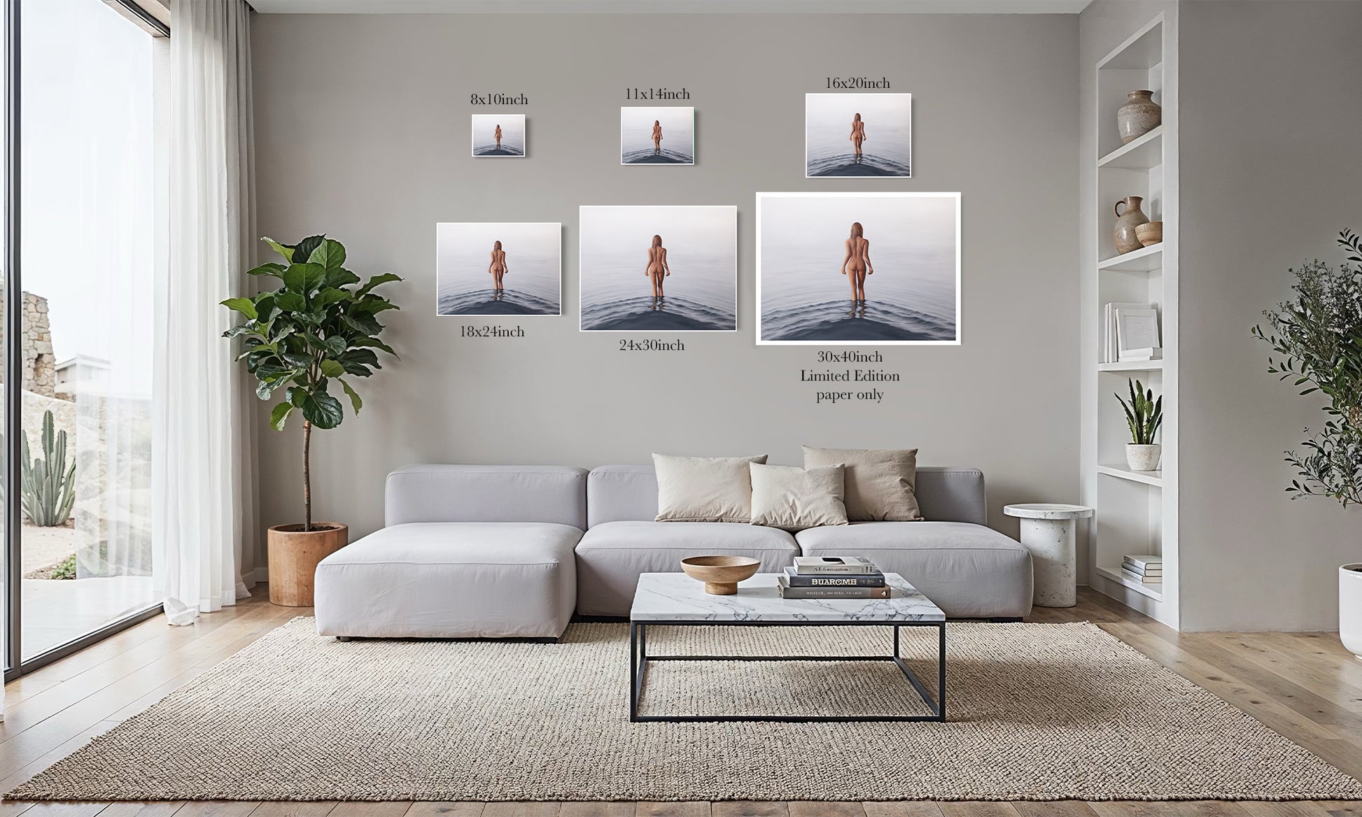 A staged living room with a light gray sectional sofa, coffee table, rug, shelving, and a wall display of five framed art prints showing a woman standing in shallow water. Small size labels and text are visible near each print.